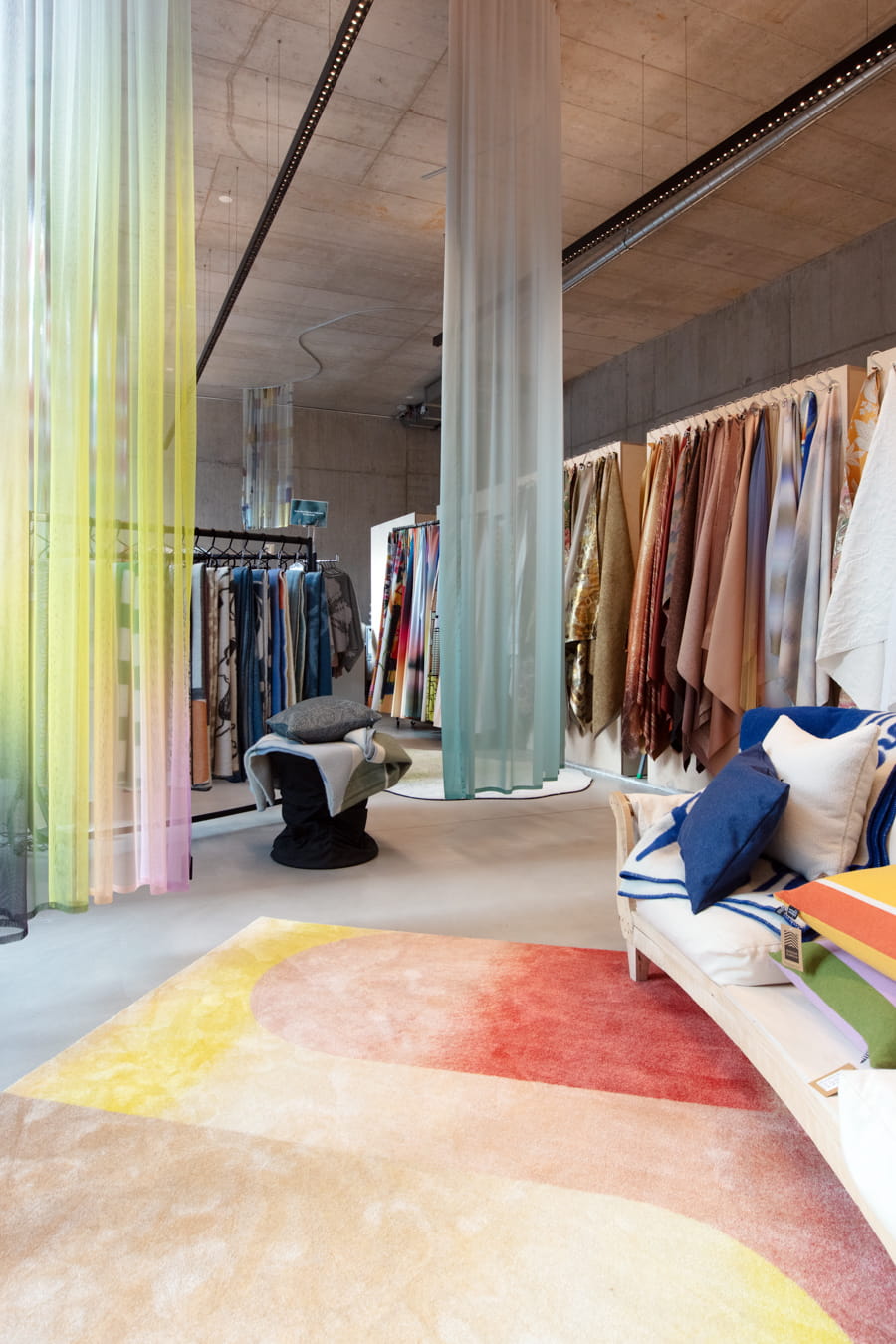 Layered translucent textile panels in pastel colours