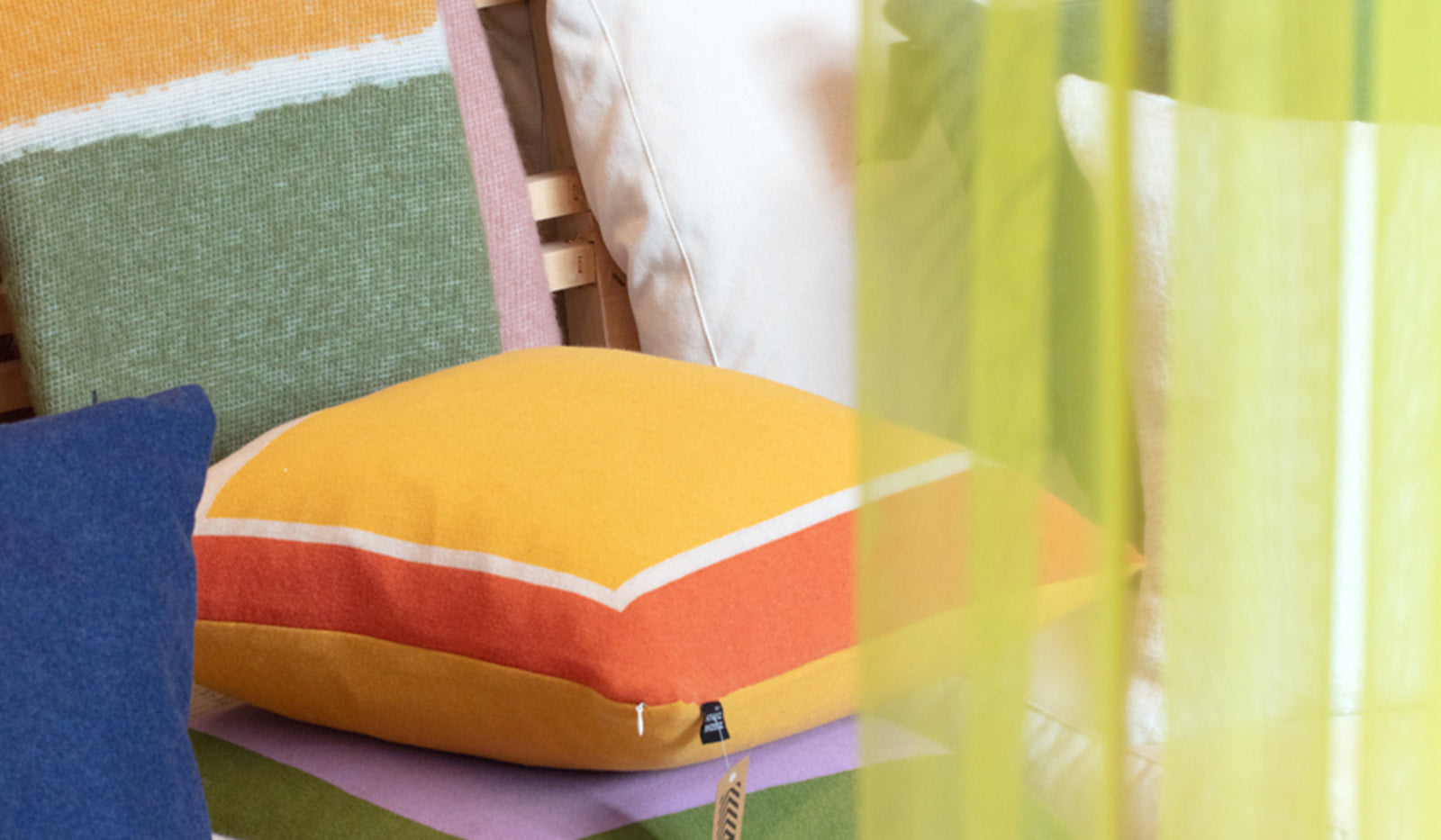 Finished cushions and sheer textiles displayed in the 4Spaces showroom